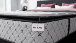 Close-up of a luxury mattress with a price tag showing RM 3,999, illustrating how much a good mattress costs in Malaysia.